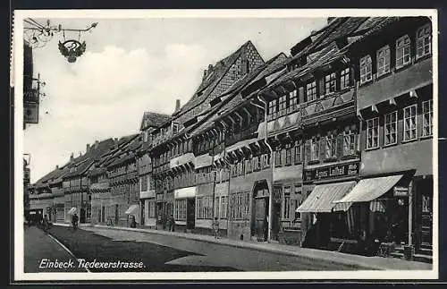 AK Einbeck, Blick in die Tiedexerstrasse mit Geschäften Agnes Leifheit, Gasthaus Schwan