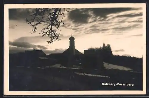 AK Sulzberg, Ortspartie mit Kirche am Abend