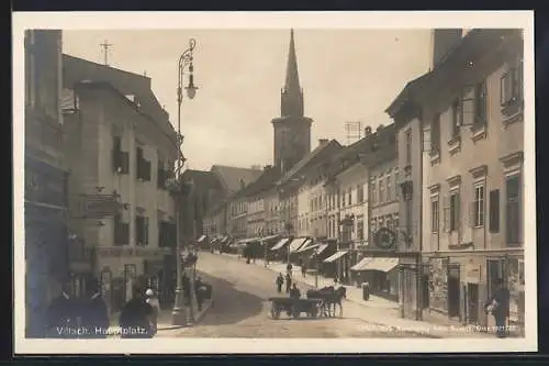 AK Villach, Hauptplatz mit Geschäften, Fuhrwerk