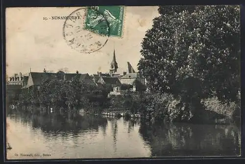 AK Nonancourt, Vue sur l`église et la rivière entourée d`arbres