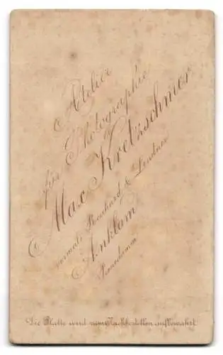 Fotografie Max Kretschmer, Anklam, Porträt eines Mannes mit Brille