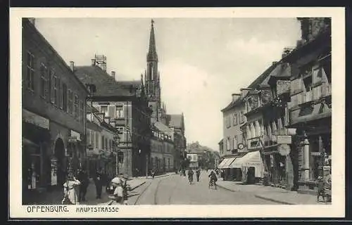 AK Offenburg, Hauptstrasse mit Geschäften und Kirche