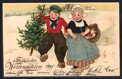 Künstler-AK Fröhliche Weihnachten, Kinder in niederländischer Tracht mit Weihnachtsbaum