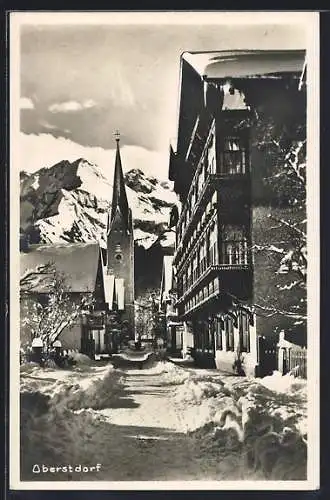 AK Oberstdorf /Allg., Kirchstrasse mit Hotel Löwen im Winter