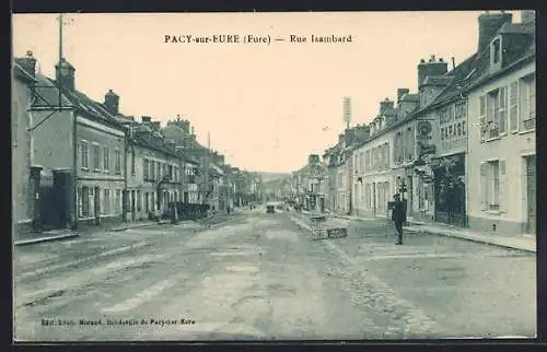 AK Pacy-sur-Eure, Rue Isambard animée avec édifices et passant