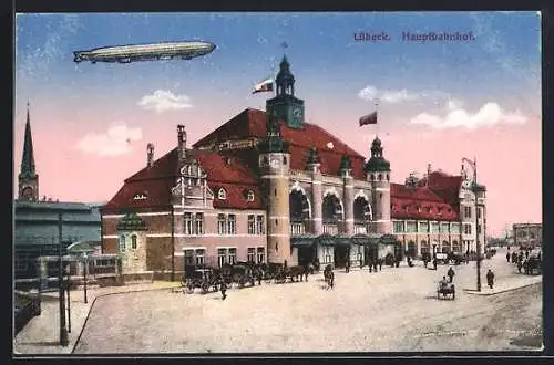 AK Lübeck, Hauptbahnhof wird von Zeppelin überflogen