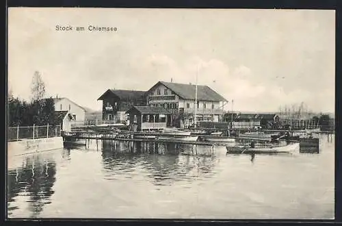 AK Stock a. Chiemsee, Ruderboote im Bootshafen