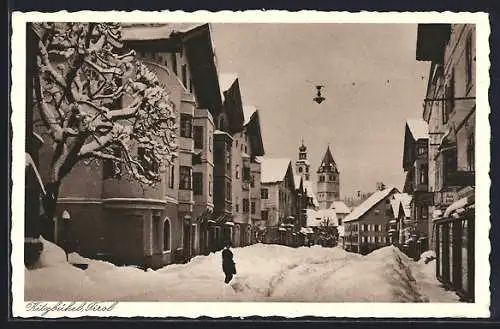 AK Kitzbühel, Teilansicht mit Kirche bei Schnee