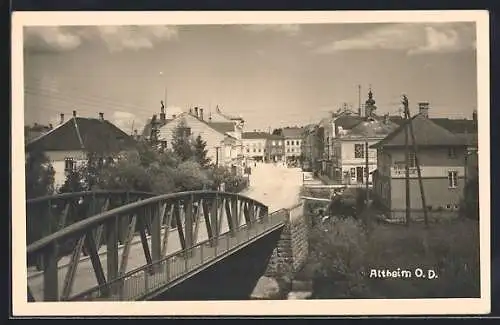 AK Altheim /O. D., Strassenpartie mit Friseurgeschäft und Brücke