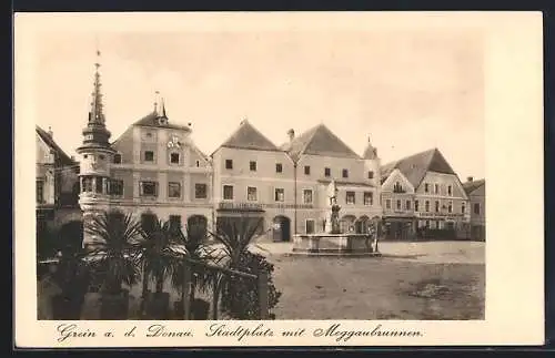 AK Grein a. d. Donau, Stadtplatz mit Meggaubrunnen und Georg Laimer`s Gasthof zum goldenen Löwen