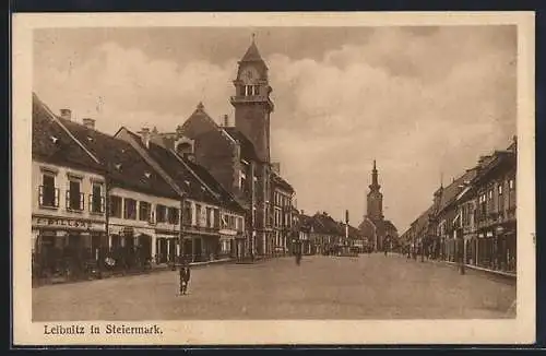 AK Leibnitz in Steiermark, Strassenpartie mit Blick zur Kirche