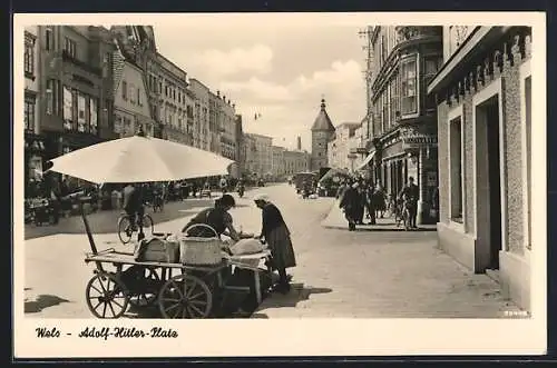 AK Wels, Platz mit Marktstand und Geschäften