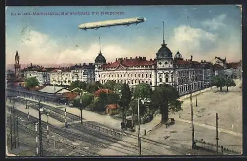 AK Konstanz, Zeppelin über dem Bahnhofplatz mit Hauptpost