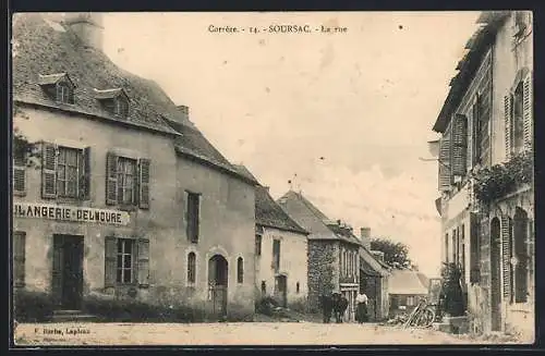 AK Soursac, La rue avec boulangerie et maisons anciennes