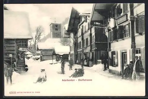 AK Adelboden, Dorfstrasse, Winterfreuden auf Schlitten