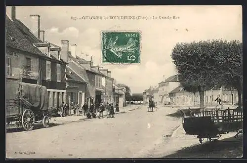 AK Ourouer-les-Bourdelins, La Grande-Rue animée avec charrettes et passants