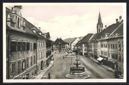 AK St. Veit a. d. G., Oberer Platz mit Geschäften und Brunnen