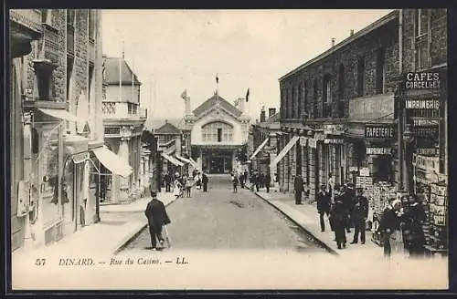 AK Dinard, Rue du Casino animée avec commerces et passants