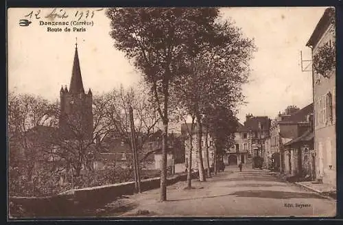 AK Donzenac, Route de Paris avec vue sur l`église et les arbres alignés