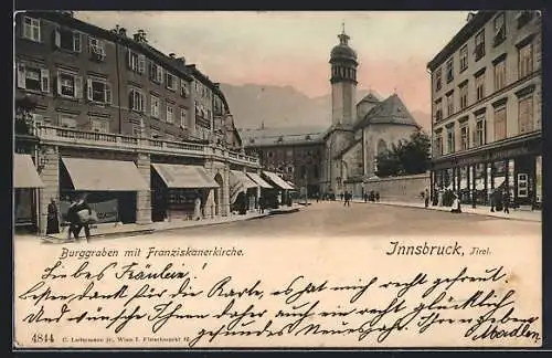 AK Innsbruck /Tirol, Burggraben mit Geschäften und Franziskanerkirche