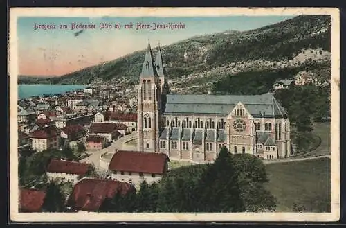 AK Bregenz am Bodensee, Strassenpartie mit Herz-Jesu-Kirche