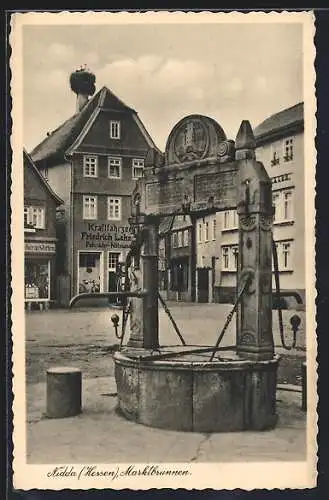 AK Nidda, Marktbrunnen mit Geschäften