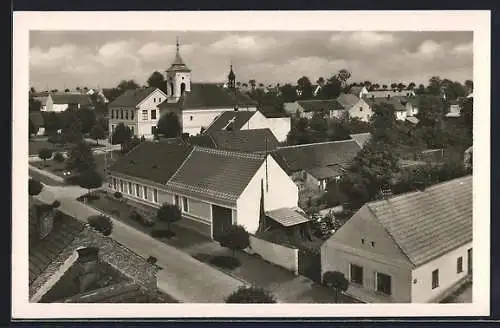 AK Sezimovo usti, Blick über die Dächer der Stadt zur Kirche