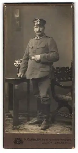 Fotografie K. Ouviller, Landau / Pfalz, Uffz. der Landwehr in Uniform mit Landwehr Mütze