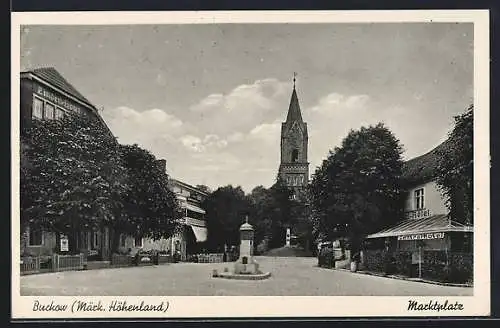 AK Bad Buckow /Märk. Schweiz, Marktplatz mit Blick zur Kirche