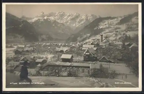 AK Schruns, Ortsansicht aus der Vogelschau im Winter