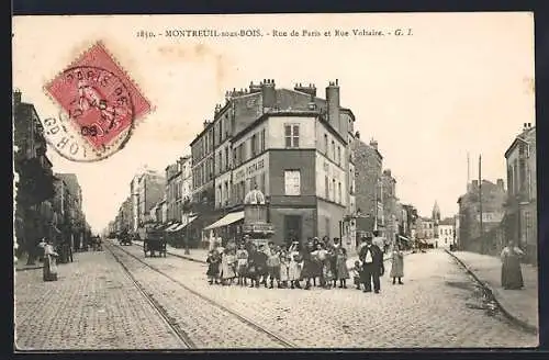 AK Montreuil-sous-Bois, Rue de Paris et Rue Voltaire avec groupe de personnes