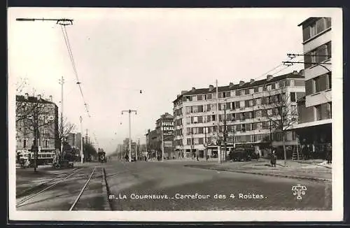 AK La Courneuve, Carrefour des 4 Routes avec tramways et immeubles urbains