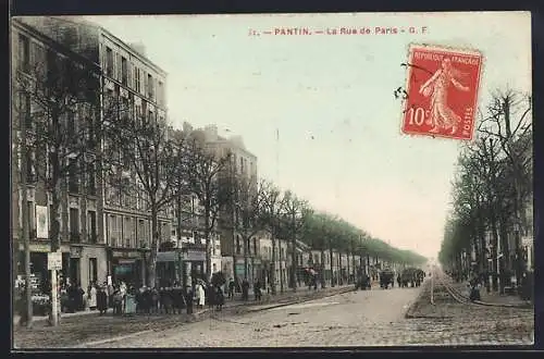 AK Pantin, La Rue de Paris avec passants et arbres en hiver