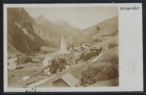 AK Heiligenblut, Teilansicht mit Kirche und Strassenpartie