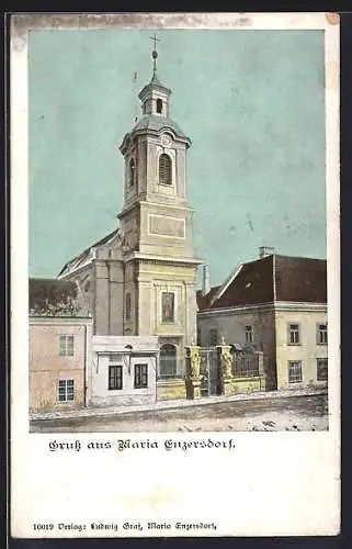 AK Maria-Enzersdorf, Strassenpartie mit Kirche