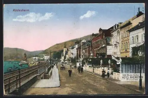 AK Rüdesheim am Rhein, Strassenpartie am Wasser mit Hotel Rheinstein