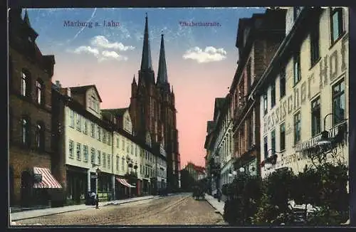 AK Marburg a. Lahn, Elisabethstrasse mit Hotel Hessischer Hof und Kirche