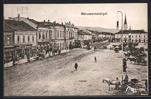 AK Máramarossziget, Strassenpartie mit Geschäften