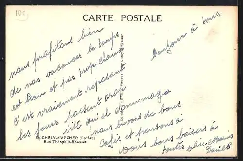 AK Saint-Chély-d`Apcher, Rue Théophile-Rousset avec passants et commerces