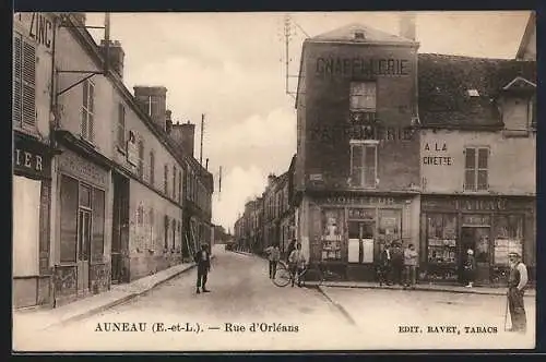 AK Auneau, Rue d`Orléans avec chapellerie et tabacs