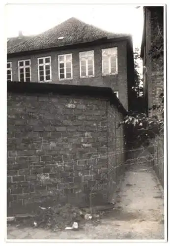 Fotografie Ansicht Rendsburg, Kleidungs- und Sportgeschäft Hans Jürgensen, Strassenpartie, Schaufenster