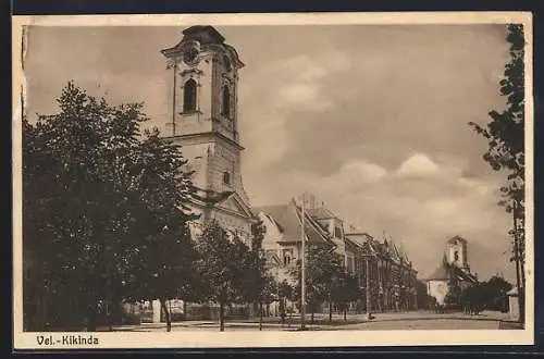 AK Vel.-Kikinda, Strassenpartie mit Kirche