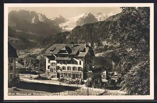 AK Hasliberg, Hotel Alpenruh mit Wetterhorngruppe