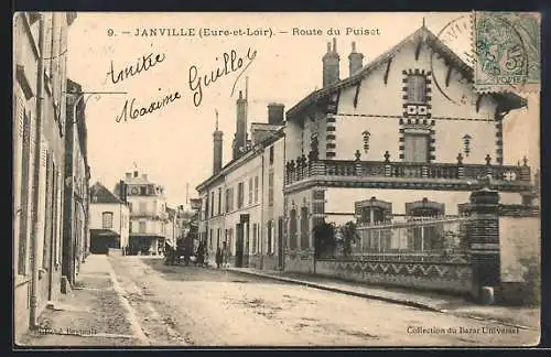 AK Janville, Route du Puiset avec bâtiments et rue calme