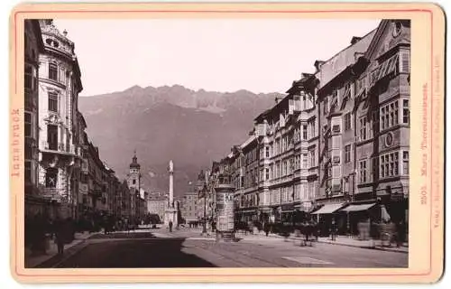 Fotografie Römmler & Jonas, Dresden, Ansicht Innsbruck, Maria Theresienstrasse, Litfasssäule und Ladengeschäfte