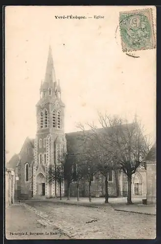 AK Yvré-l`Évêque, Église et rue adjacente en hiver