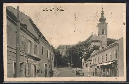 AK Ob.-St. Veit, Strassenpartie mit Geschäften und Kirche