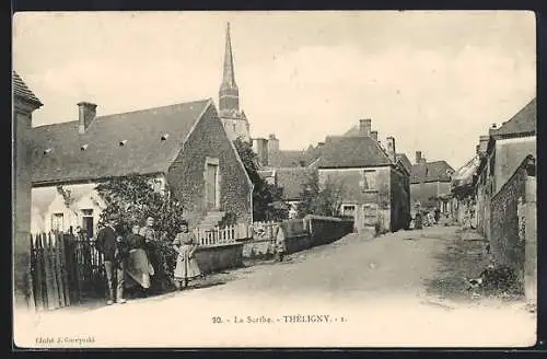 AK Théligny, Vue du village avec clocher dominant la rue principale