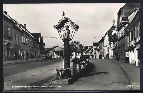 AK Kindberg, Platz mit Geschäften und Kindlbrunnen