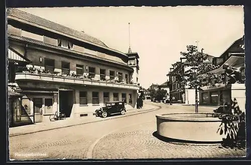 AK Herzogenbuchsee, Strassenpartie am Brunnen